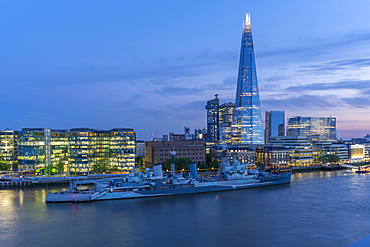 View of the Shard, HMS Belfast and River Thames from Cheval Three Quays at dusk, London, England, United Kingdom, Europe
