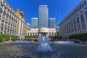 View of Canary Wharf tall buildings and fountains, Docklands, London, England, United Kingdom, Europe