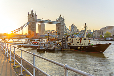 View of Tower Bridge and the City of London in the background at sunset, London, England, United Kingdom, Europe