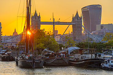 View of Tower Bridge and the City of London in the background at sunset, London, England, United Kingdom, Europe