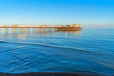 View of sea front and Brighton Palace Pier in late afternoon sunshine, Brighton, East Sussex, England, United Kingdom, Europe