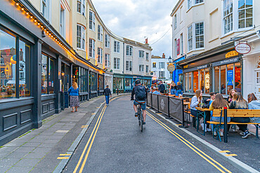 View of cafes and restaurants, Alfresco dining in The Lanes at dusk, Brighton, Sussex, England, United Kingdom, Europe