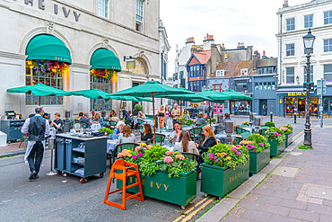 View of The Ivy Restaurant, Alfresco dining in The Lanes at dusk, Brighton, Sussex, England, United Kingdom, Europe