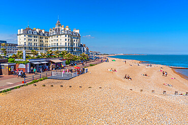 View of beach and sea front hotels from Eastbourne pier in summer time, Eastbourne, East Sussex, England, United Kingdom, Europe