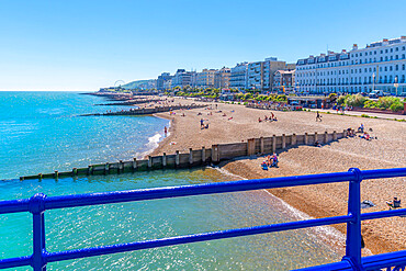 View of beach and sea front hotels from Eastbourne pier in summer time, Eastbourne, East Sussex, England, United Kingdom, Europe