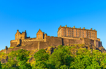 View of Edinburgh Castle from Princes Street at sunset, UNESCO World Heritage Site, Edinburgh, Scotland, United Kingdom, Europe