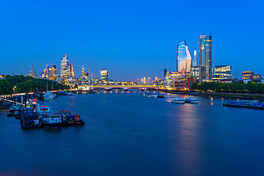 View of Blackfriars Bridge over the River Thames, St. Paul's Cathedral and The City of London skyline at dusk, London, England, United Kingdom, Europe