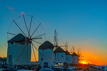 View of windmills at sunset, Mykonos Town, Mykonos, Cyclades Islands, Greek Islands, Aegean Sea, Greece, Europe