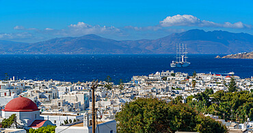 View of town and tall ship, Mykonos Town, Mykonos, Cyclades Islands, Greek Islands, Aegean Sea, Greece, Europe