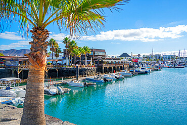 View of boats and the restaurants in Rubicon Marina, Playa Blanca, Lanzarote, Canary Islands, Spain, Atlantic, Europe