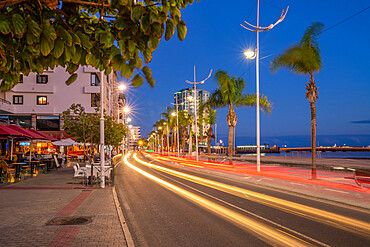 View of trail lights along promenade at dusk, Arrecife, Lanzarote, Canary Islands, Spain, Atlantic, Europe