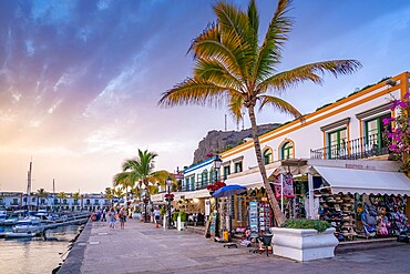 View of cafes and restaurants and palm trees in the Old Port, Puerto de Mogan at sunset, Gran Canaria, Canary Islands, Spain, Atlantic, Europe