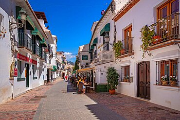 View of cafes and restaurants in the old town of Nerja, Nerja, Costa del Sol, Malaga Province, Andalusia, Spain, Europe