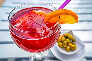 Sangria and olives at Playa de Burriana beach in Nerja, Costa del Sol, Malaga Province, Andalusia, Spain, Europe