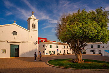 View of Sant Antoni de Fornells church in whitewashed street in Fornelles, Fornelles, Menorca, Balearic Islands, Spain, Mediterranean, Europe