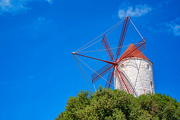 View of windmill against blue sky in Es Mercadal, Menorca, Balearic Islands, Spain, Mediterranean, Europe