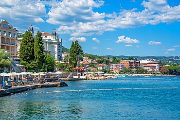 View of hotels and sunshades on The Lungomare promenade in the town of Opatija, Opatija, Kvarner Bay, Croatia, Europe