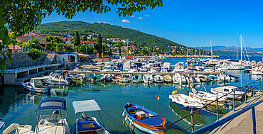 View of boats in the marina and Adriatic Sea at Icici, Icici, Kvarner Bay, Croatia, Europe