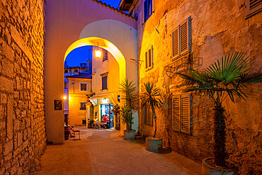 View of cafe bar at dusk, Lovran, Kvarner Bay, Eastern Istria, Croatia, Europe