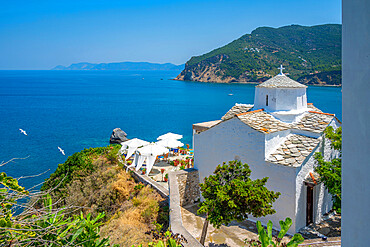 View of whitewashed church overlooking the Aegean Sea, Skopelos Town, Skopelos Island, Sporades Islands, Greek Islands, Greece, Europe