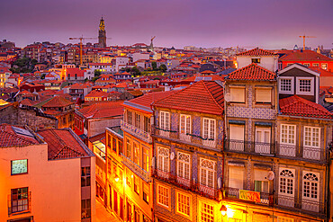 View of buildings and terracota rooftops of The Ribeira district at dusk, UNESCO World Heritage Site, Porto, Norte, Portugal, Europe