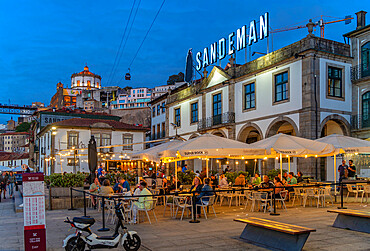 View of Sandeman Winery (Port Wine Cellar) and restaurant at dusk, Vila Nova de Gaia, Porto, Norte, Portugal, Europe