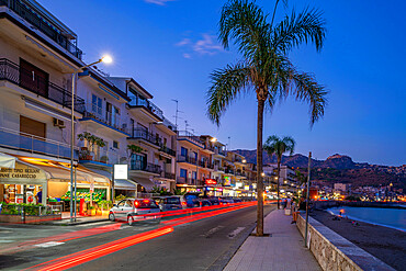 View of Giardini-Naxos promenade at dusk, Province of Messina, Sicily, Italy, Mediterranean, Europe