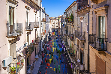 View of street with colourful bunting near Piazza Stesicoro, Catania, Sicily, Italy, Mediterranean, Europe