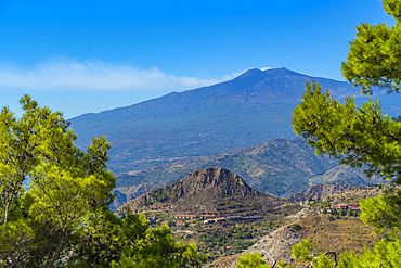 View of landscape with Mount Etna, UNESCO World Heritage Site, in background from Castelmola, Taormina, Sicily, Italy, Mediterranean, Europe