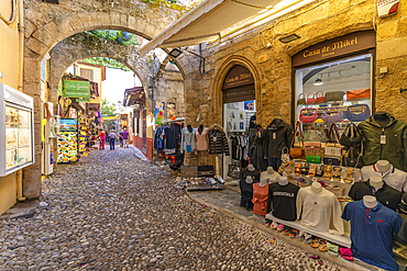 View of shops in cobbled street, Old Rhodes Town, UNESCO World Heritage Site, Rhodes, Dodecanese, Greek Islands, Greece, Europe