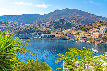 View of boats in harbour from elevated position, Symi Town, Symi Island, Dodecanese, Greek Islands, Greece, Europe