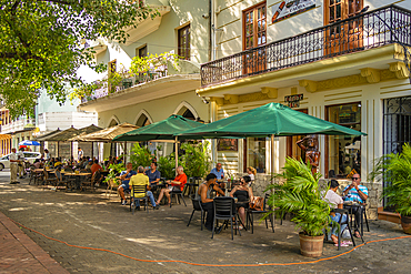 View of cafe and restaurant in Columbus Park, Santo Domingo, Dominican Republic, West Indies, Caribbean, Central America