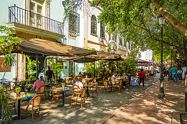 View of cafe and restaurant in Columbus Park, Santo Domingo, Dominican Republic, West Indies, Caribbean, Central America