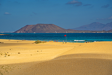 View of beach, Lobos Island and the Atlantic Ocean on a sunny day, Corralejo Natural Park, Fuerteventura, Canary Islands, Spain, Atlantic, Europe