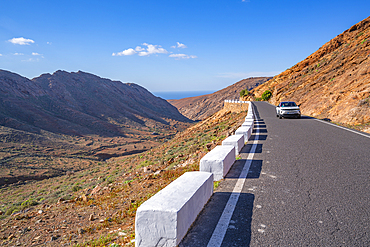 View of road through landscape near Vega de Rio Palmas, Betancuria, Fuerteventura, Canary Islands, Spain, Atlantic, Europe