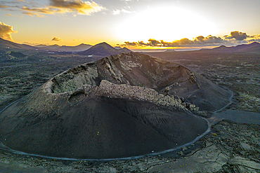 Aerial view of El Cuervo Volcano at sunset, Timanfaya National Park, Lanzarote, Las Palmas, Canary Islands, Spain, Atlantic, Europe