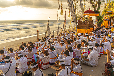 View of people at prayer on Kuta Beach for Nyepi, Balinese New Year Celebrations, Kuta, Bali, Indonesia, South East Asia, Asia