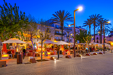 View of restaurants and bars near harbour at dusk, UNESCO World Heritage Site, Ibiza Town, Eivissa, Balearic Islands, Spain, Mediterranean, Europe