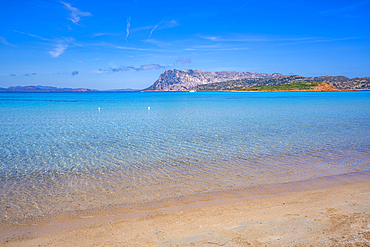 View of Capo Coda Cavallo beach and Isola di Tavolara in the background, Sardinia, Italy, Mediterranean, Europe