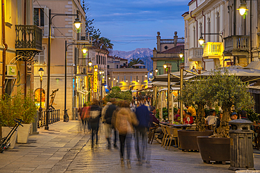 View of restaurants on Corso Umberto I at dusk in Olbia, Olbia, Sardinia, Italy, Mediterranean, Europe