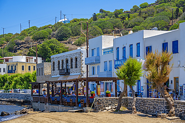 View of small beach and shops in the town of Mandraki, Mandraki, Nisyros, Dodecanese, Greek Islands, Greece, Europe