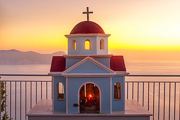 View of miniature Greek Orthodox church on coastal road near Assos, Kefalonia, Ionian Islands, Greek Islands, Greece, Europe