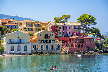 View of harbour and colourful houses in Assos, Assos, Kefalonia, Ionian Islands, Greek Islands, Greece, Europe