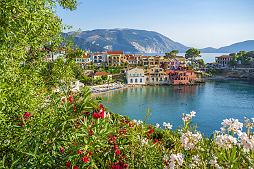 Elevated view of harbour and colourful houses in Assos, Assos, Kefalonia, Ionian Islands, Greek Islands, Greece, Europe