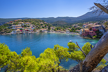 View of harbour and colourful houses in Assos, Assos, Kefalonia, Ionian Islands, Greek Islands, Greece, Europe