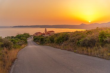 View of Holy Monastery of the Most Holy Theotokos of Sissia near Lourdata at sunset, Kefalonia, Ionian Islands, Greek Islands, Greece, Europe