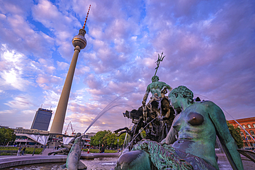 View of Berliner Fernsehturm and Neptunbrunnen fountain at dusk, Panoramastrasse, Berlin, Germany, Europe