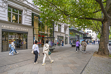 View of shops on the tree lined Kurfurstendam in Berlin, Germany, Europe