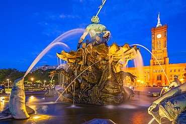 View of Rotes Rathaus (Town Hall) and Neptunbrunnen fountain at dusk, Panoramastrasse, Berlin, Germany, Europe