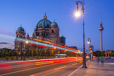 View of Berliner Dom (Berlin Cathedral) and trail lights at dusk, Berlin, Germany, Europe